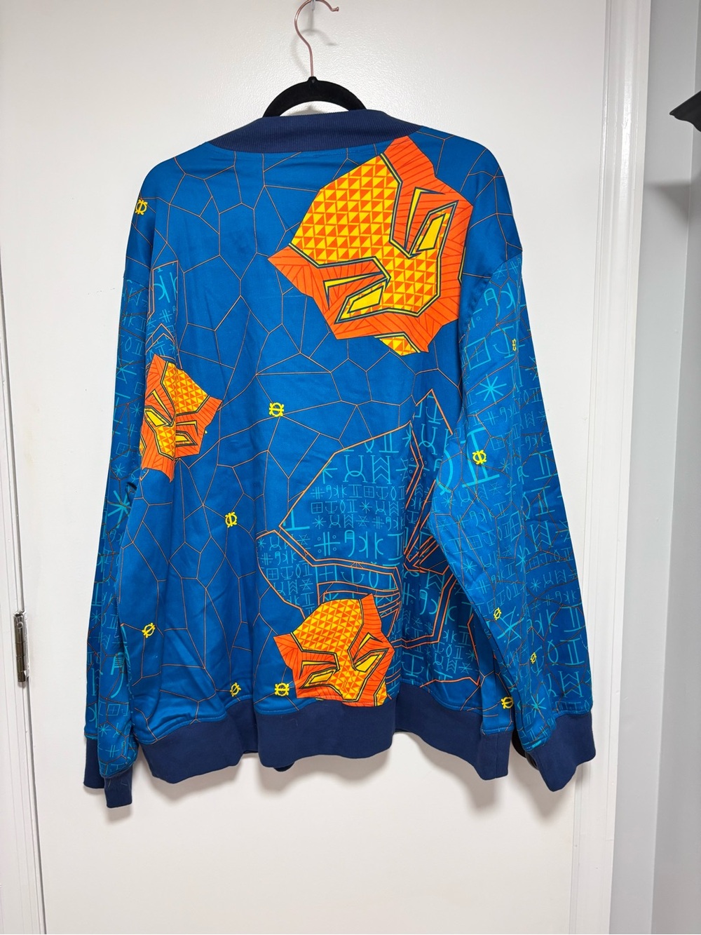 Reversible Marvel Blue Bomber Jacket with Purple Floral and Orange Chain Details - Picture 5 of 16
